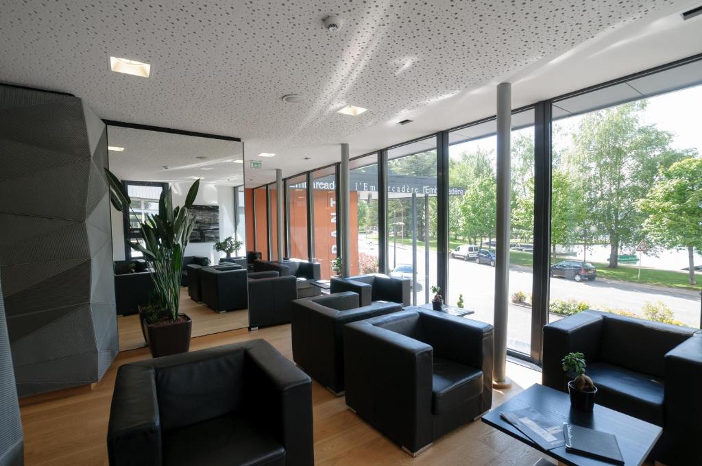 Posezení v ubytování Hôtel-Restaurant de l'Embarcadère