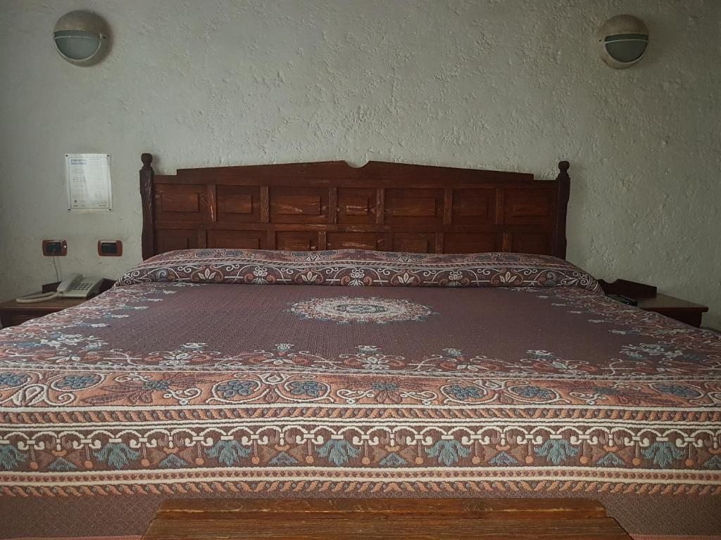 Postel nebo postele na pokoji v ubytování State Inn