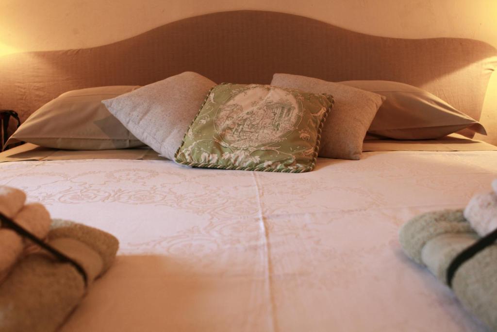 Postel nebo postele na pokoji v ubytování B&B Casa Meli