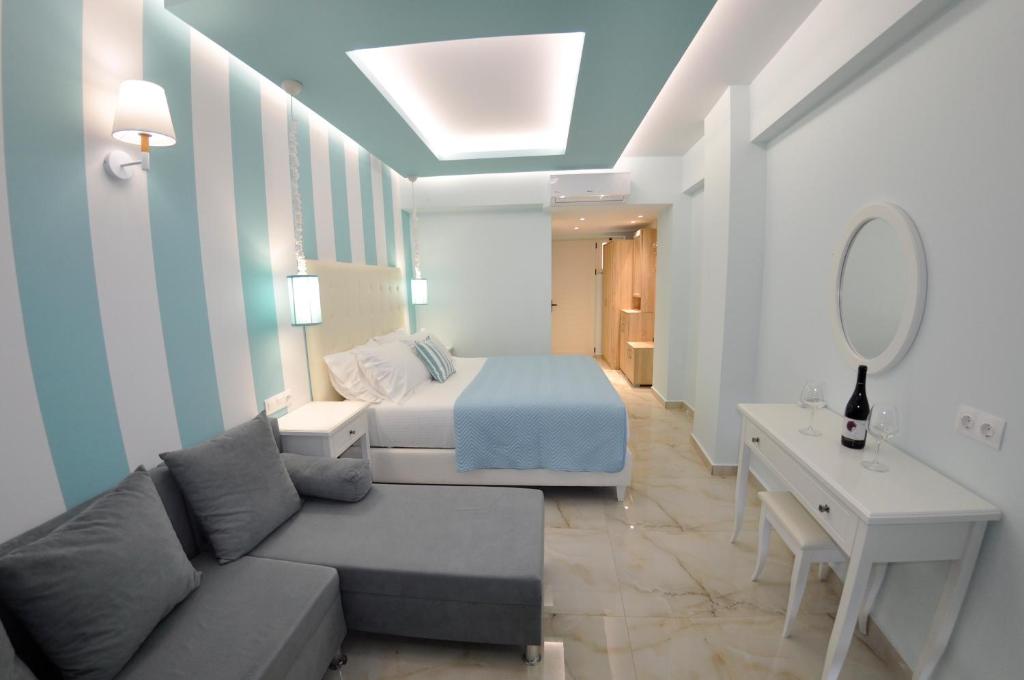 Postel nebo postele na pokoji v ubytování Agios Gordios Beach Resort