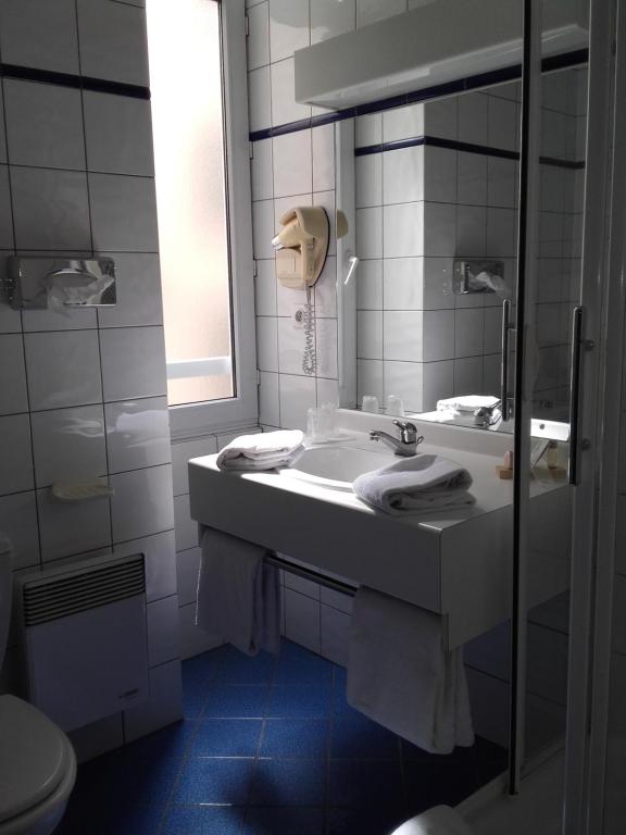 Koupelna v ubytování Hôtel Foch