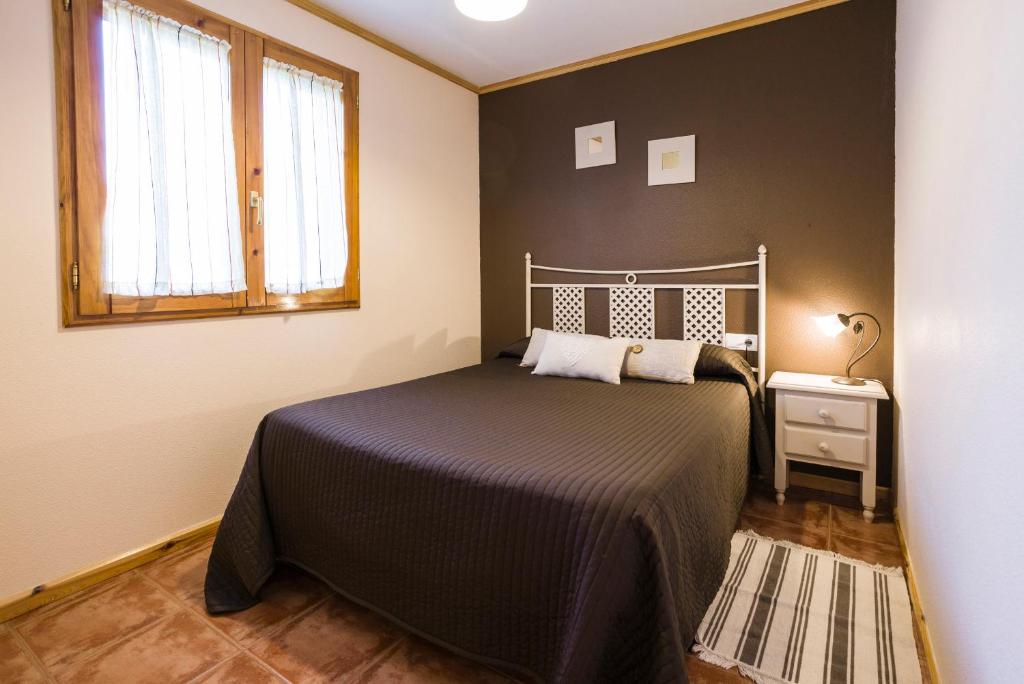 Posteľ alebo postele v izbe v ubytovaní Apartamentos Turísticos Matagacha