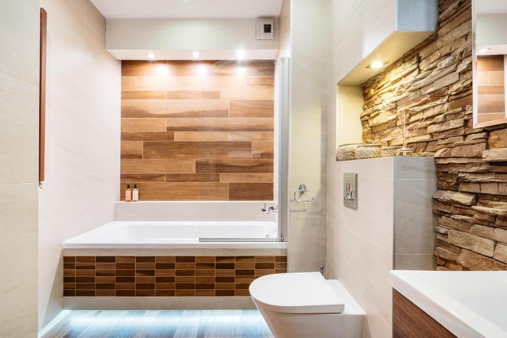 Kúpeľňa v ubytovaní Brewery Apartment - LoftAffair