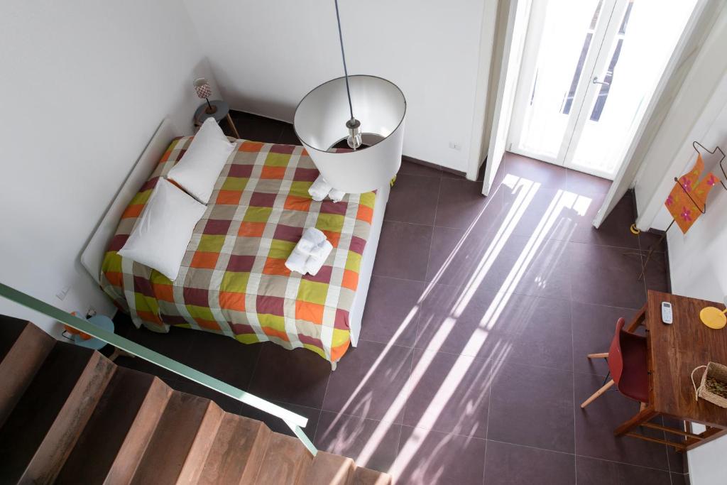 Łóżko lub łóżka w pokoju w obiekcie Casa Magà
