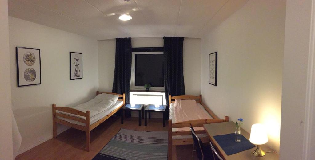 Postel nebo postele na pokoji v ubytování Åtorps herrgård
