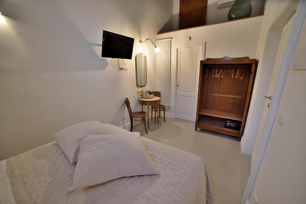 Letto o letti in una camera di B&B Murex