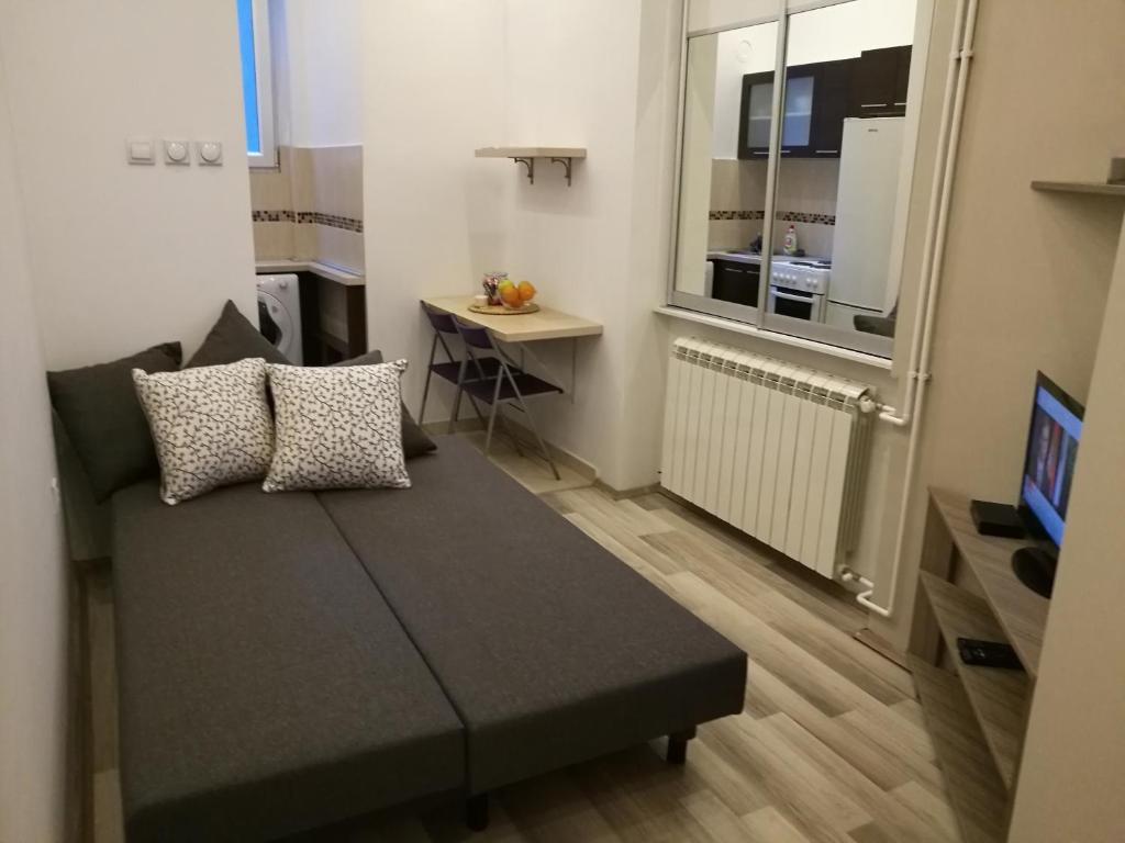 Apartment in the Heart of Belgrade tesisinde bir odada yatak veya yataklar