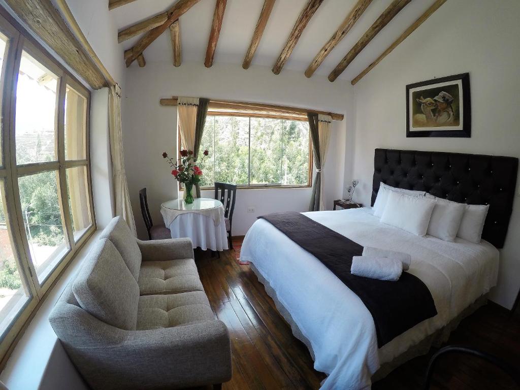 Postel nebo postele na pokoji v ubytování Parwa Guest House