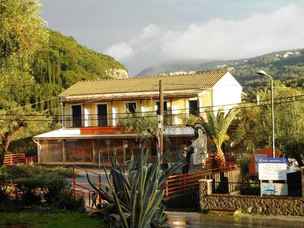 a house sitting on top of a mountain at Anemona Studios in Paleokastritsa