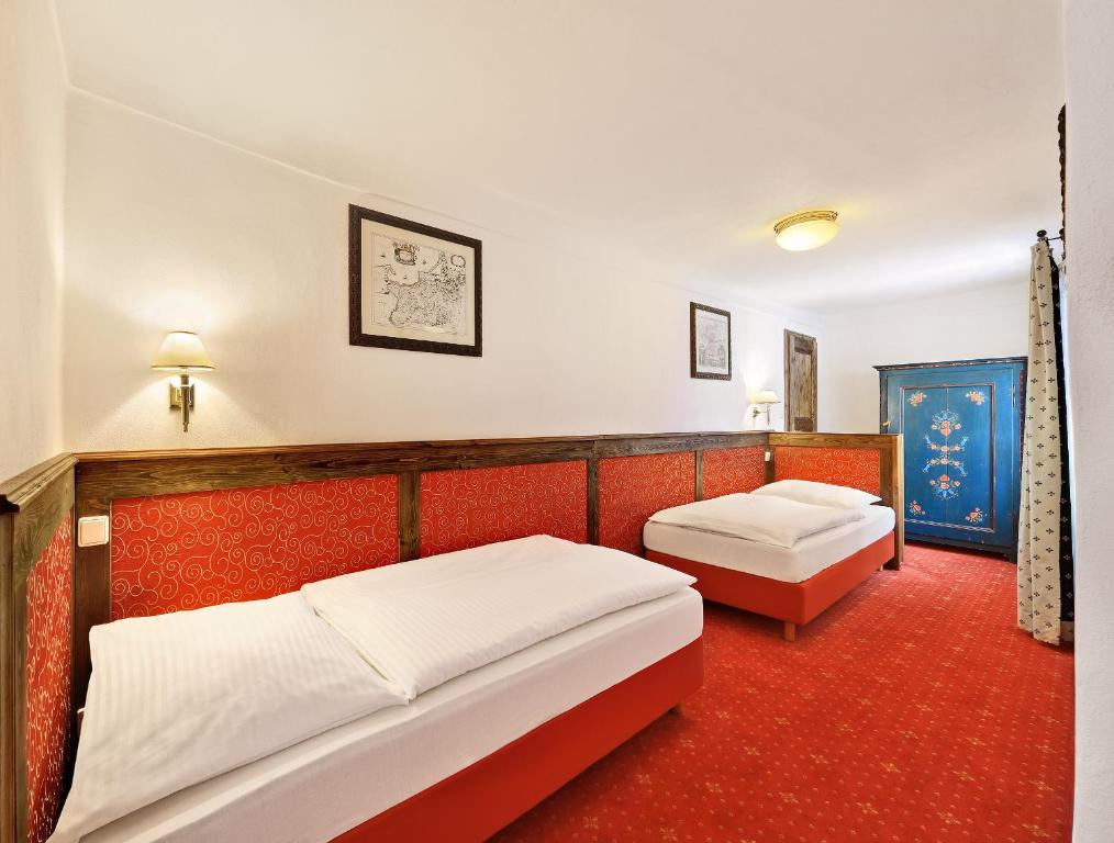 Cama o camas de una habitación en Hotel Konvice