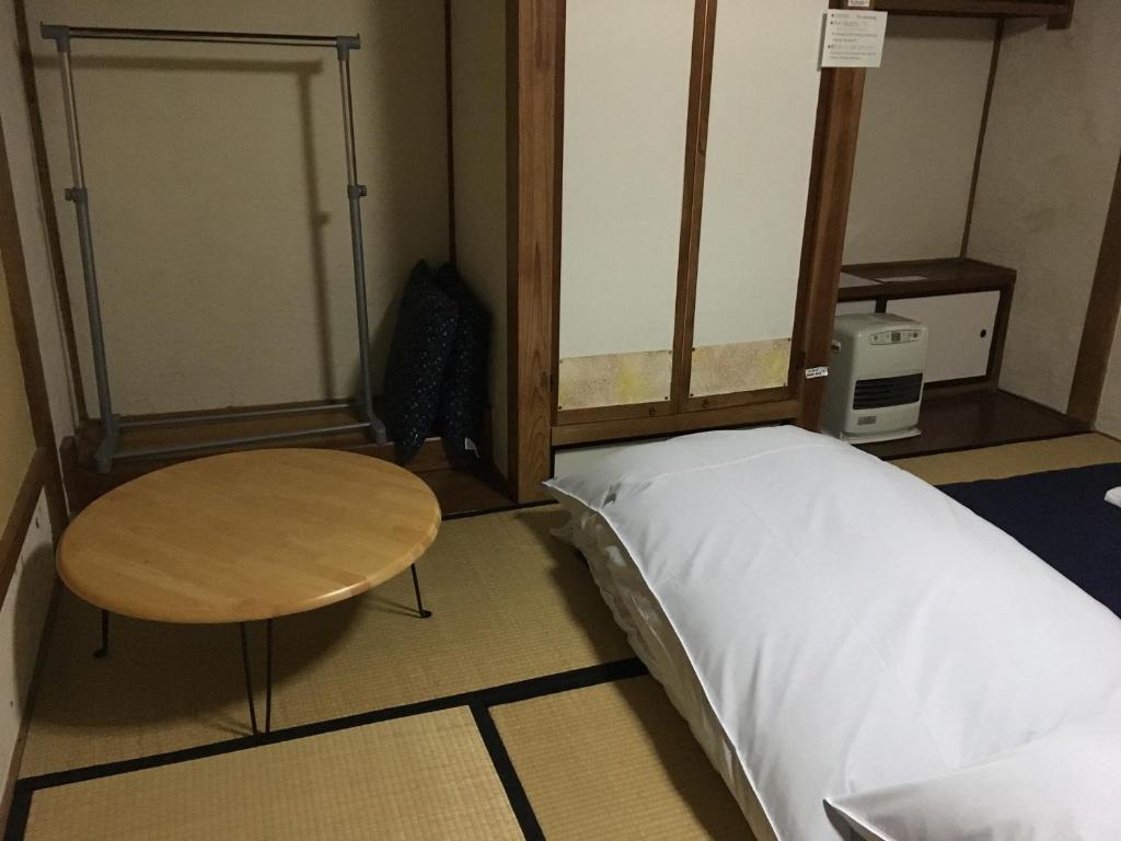 Voodi või voodid majutusasutuse Guest House YAMASHITA-YA toas