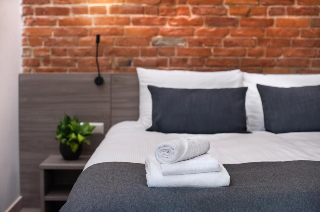 Postel nebo postele na pokoji v ubytování Dangė Hotel