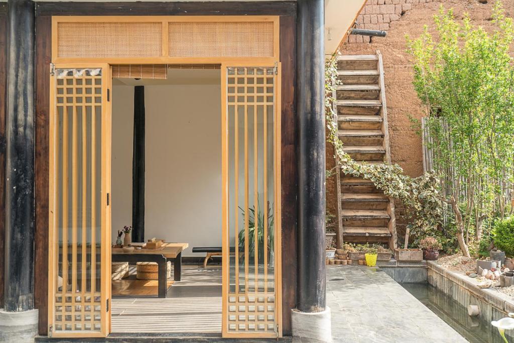 Fotografie z fotogalerie ubytování Dali Shaxi Qing Jing Courtyard v destinaci Jianchuan