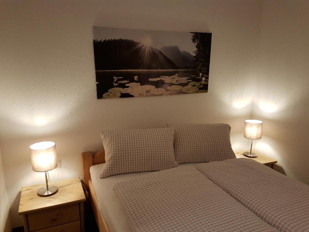 Postel nebo postele na pokoji v ubytování Haus Alpenglühn