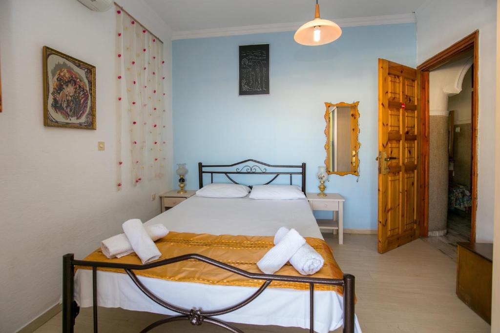 Postel nebo postele na pokoji v ubytování Apartment Evaggelia Sea View