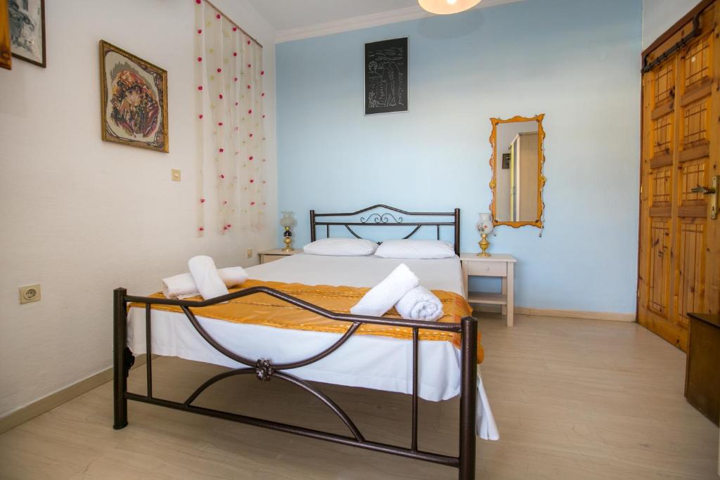 Postel nebo postele na pokoji v ubytování Apartment Evaggelia Sea View