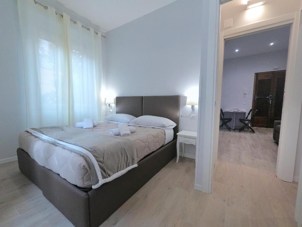 Postel nebo postele na pokoji v ubytování B&B Aurelia Garden Rooms