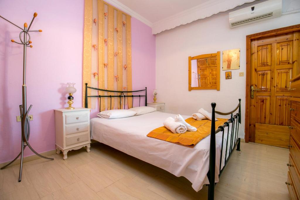 Postel nebo postele na pokoji v ubytování Apartment Evaggelia Sea View