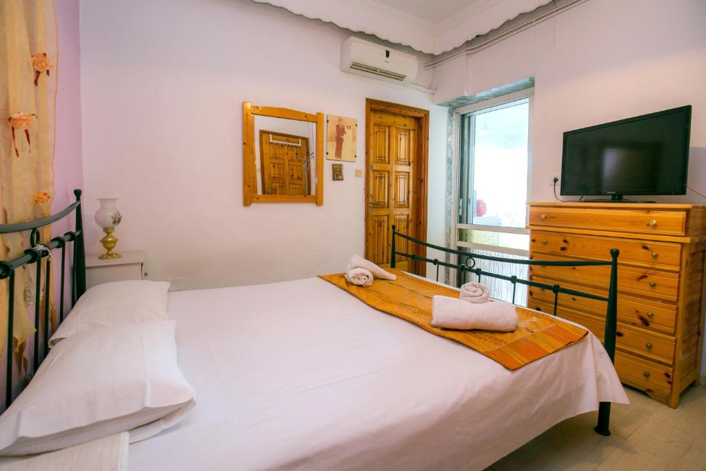 Postel nebo postele na pokoji v ubytování Apartment Evaggelia Sea View