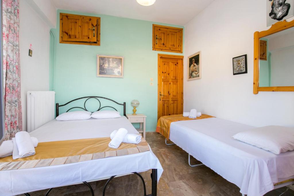 Postel nebo postele na pokoji v ubytování Apartment Evaggelia Sea View