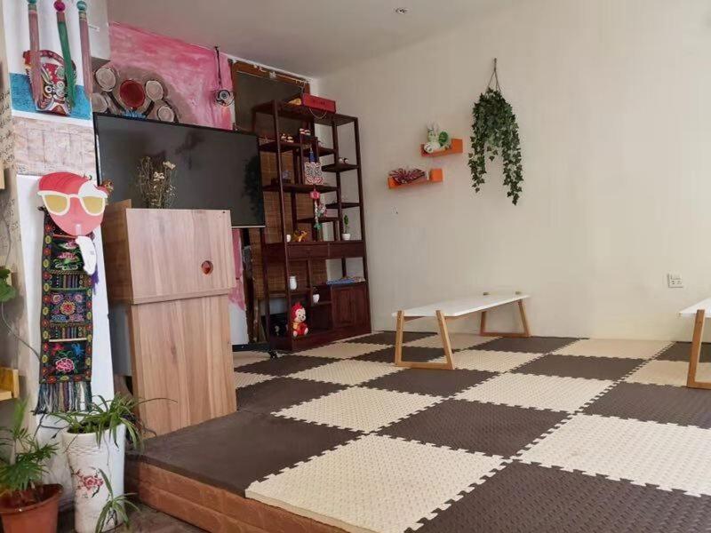 Postel nebo postele na pokoji v ubytování Xi'an The Facebook Youth Hostel
