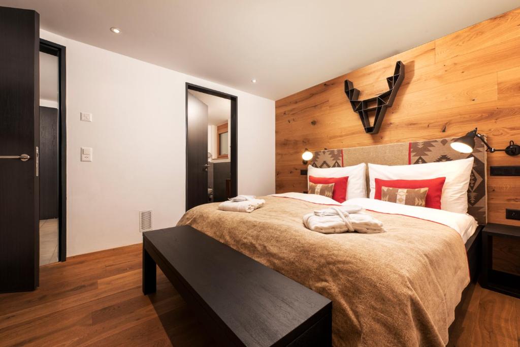 Postel nebo postele na pokoji v ubytování Chalet Nepomuk