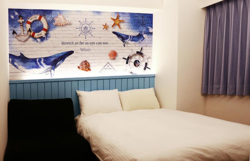 Postel nebo postele na pokoji v ubytování Haozhan Hotel