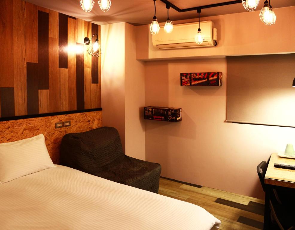 Postel nebo postele na pokoji v ubytování Haozhan Hotel