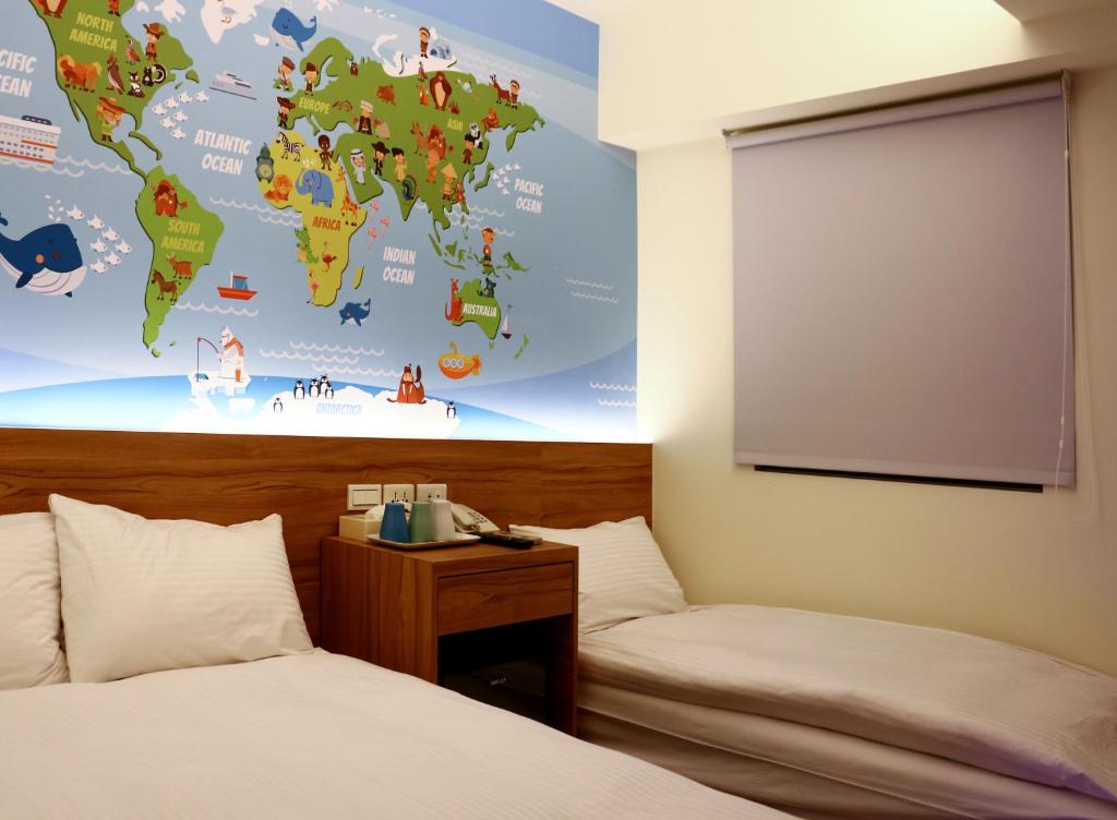 Postel nebo postele na pokoji v ubytování Haozhan Hotel