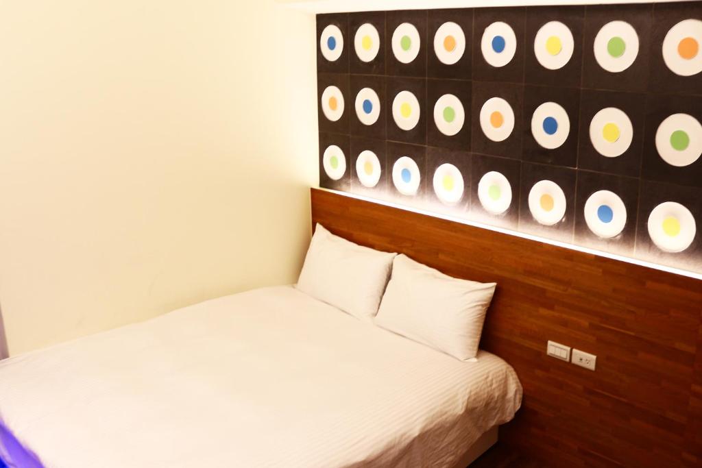 Postel nebo postele na pokoji v ubytování Haozhan Hotel