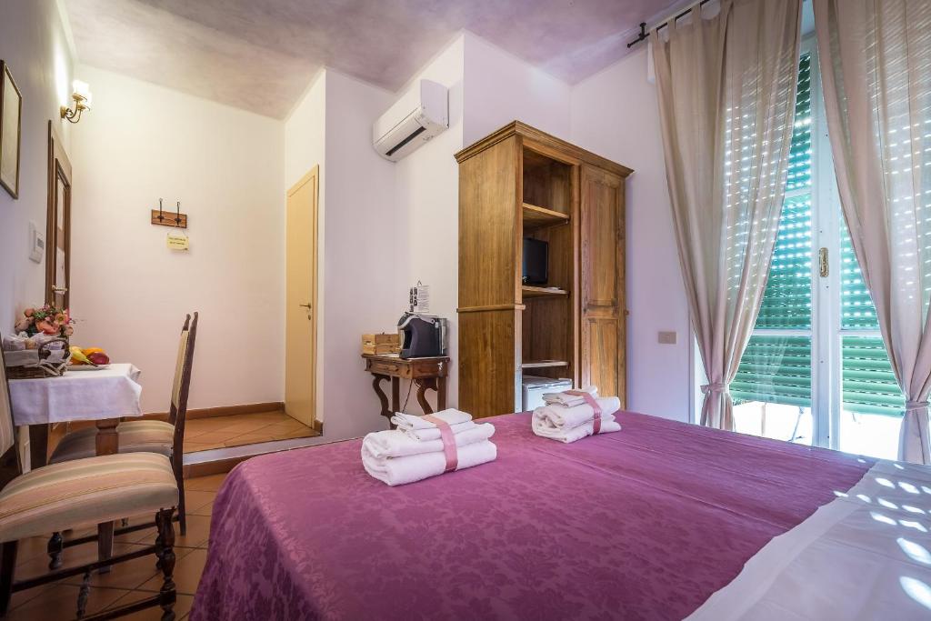 Posteľ alebo postele v izbe v ubytovaní Alla Dimora Altea