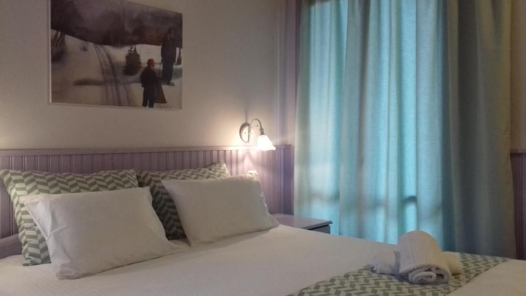 Postel nebo postele na pokoji v ubytování Guesthouse Mavrodimos