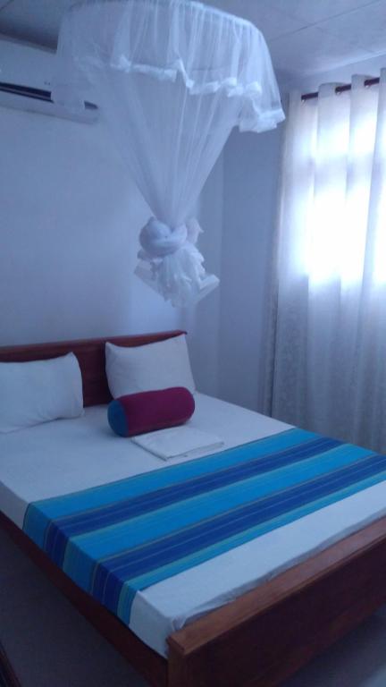 Postel nebo postele na pokoji v ubytování Umaya Holiday Home