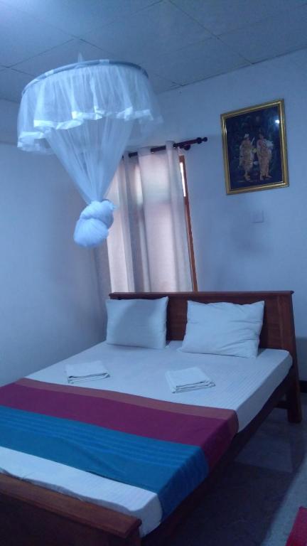 Postel nebo postele na pokoji v ubytování Umaya Holiday Home