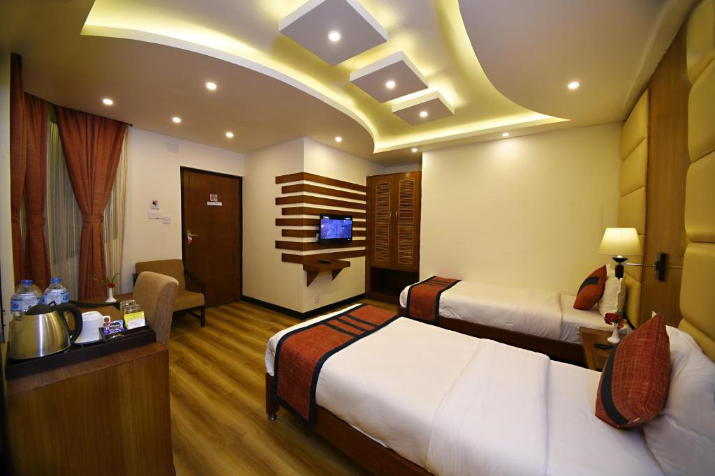 Postel nebo postele na pokoji v ubytování Hotel Jampa