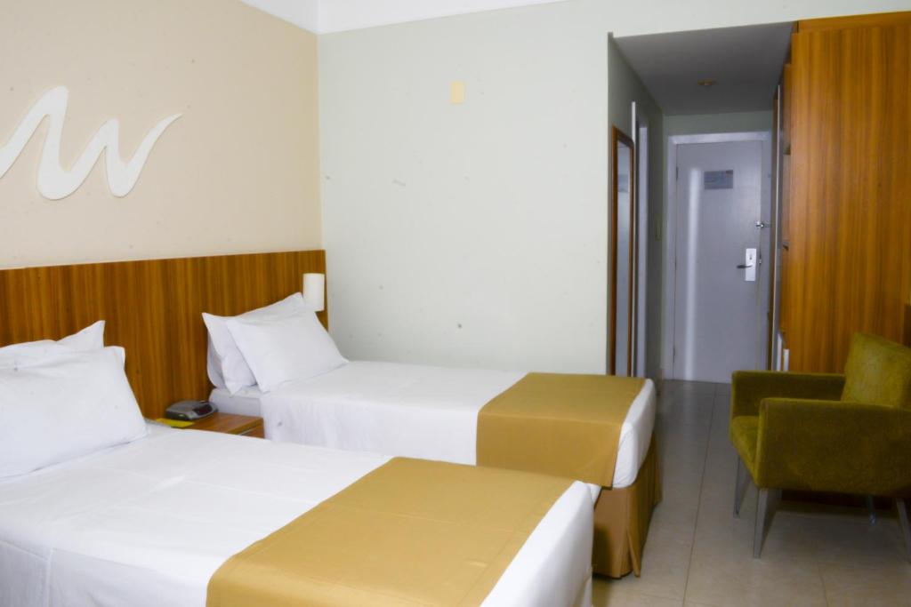 Postel nebo postele na pokoji v ubytování Real Classic Hotel