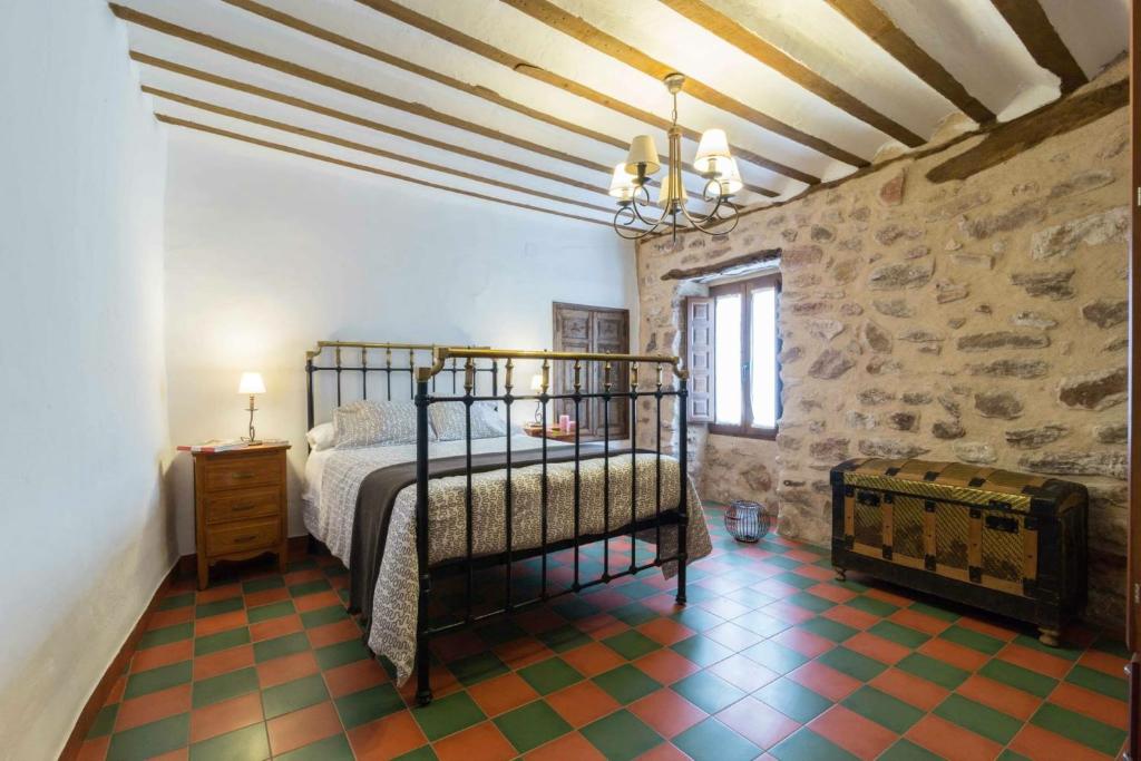 Un pat sau paturi într-o cameră la EL CHARQUILLO CR