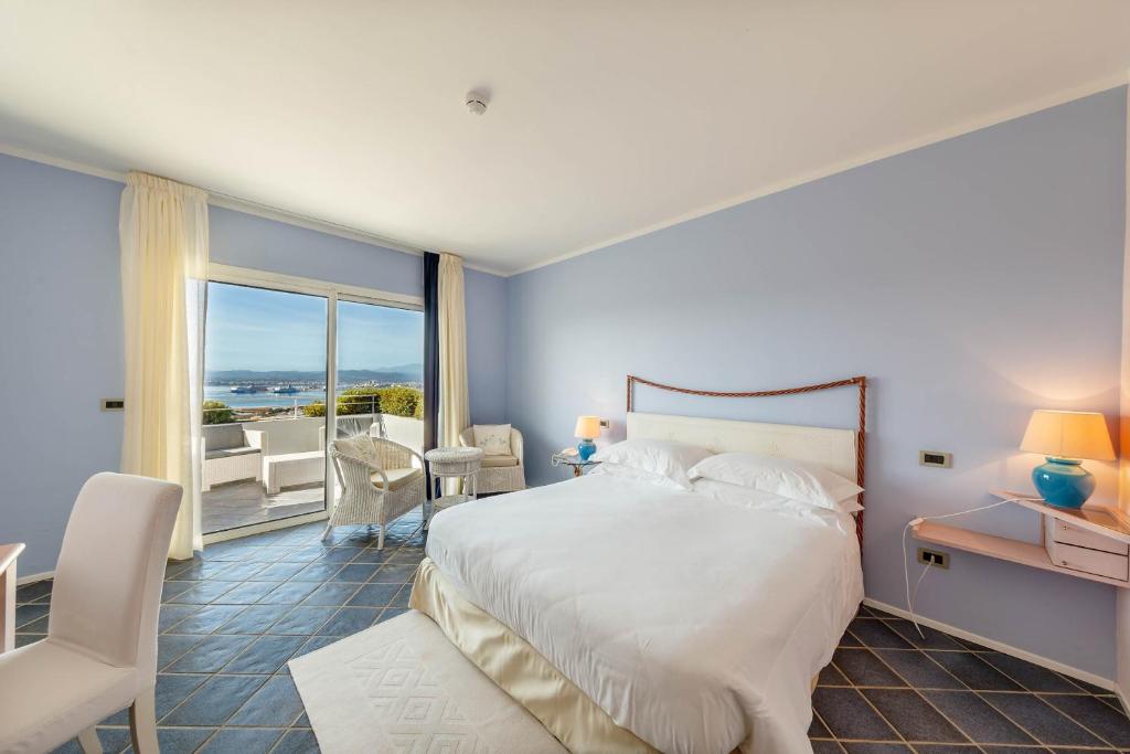 Cama ou camas em um quarto em Hotel Luna Lughente
