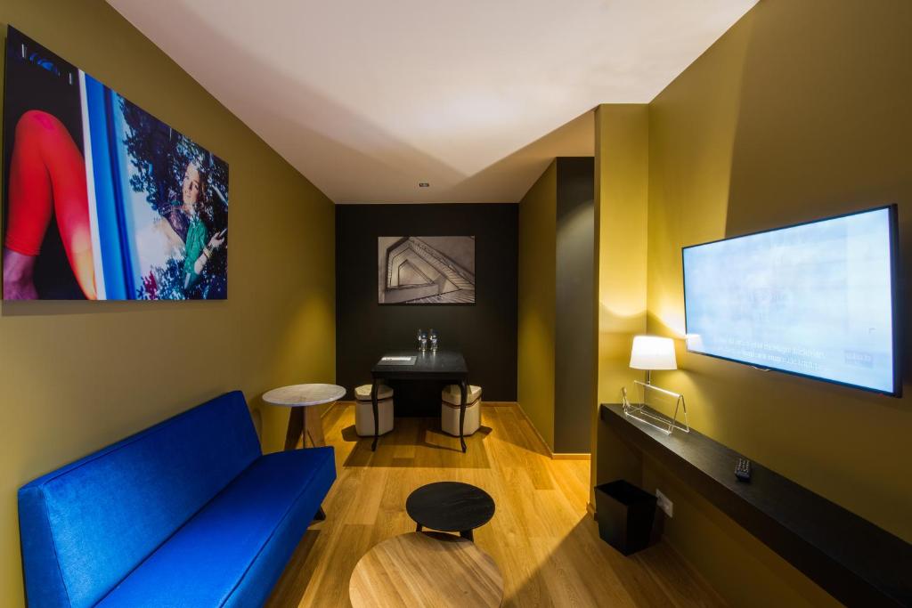 TV a/nebo společenská místnost v ubytování Hotel The Royal Snail