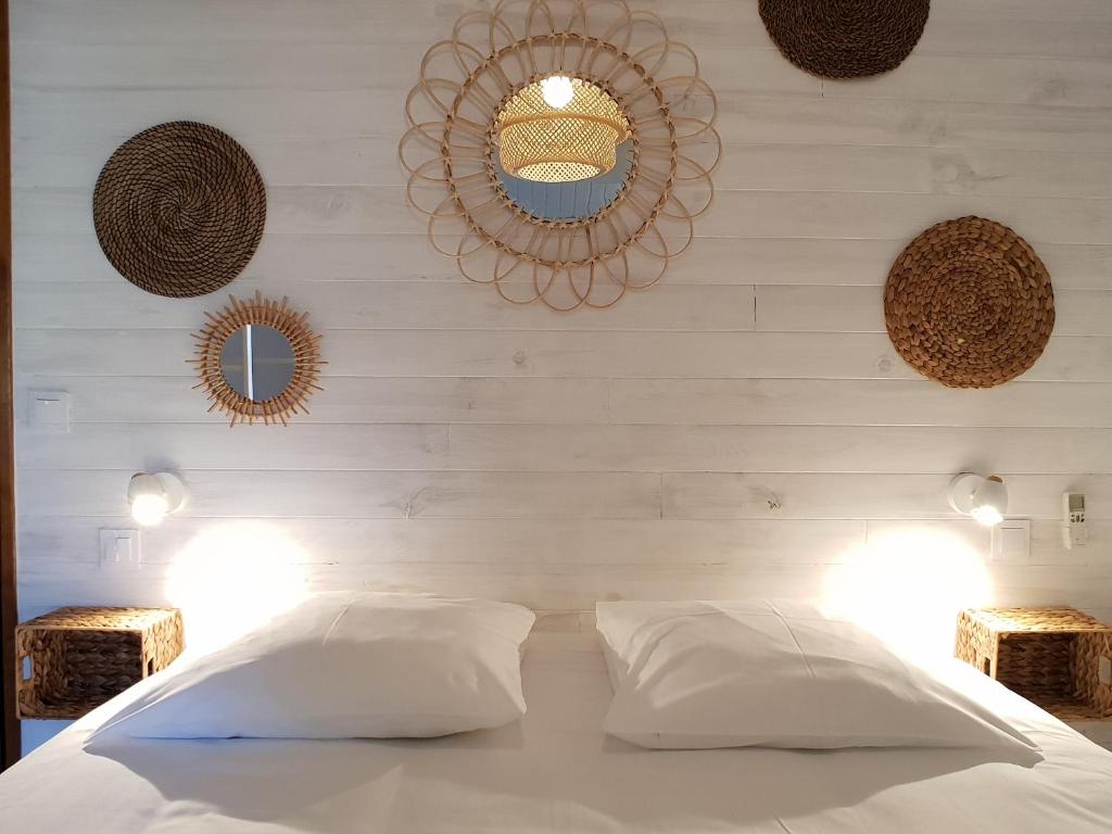 Postel nebo postele na pokoji v ubytování Hôtel La Bastide de Vaison