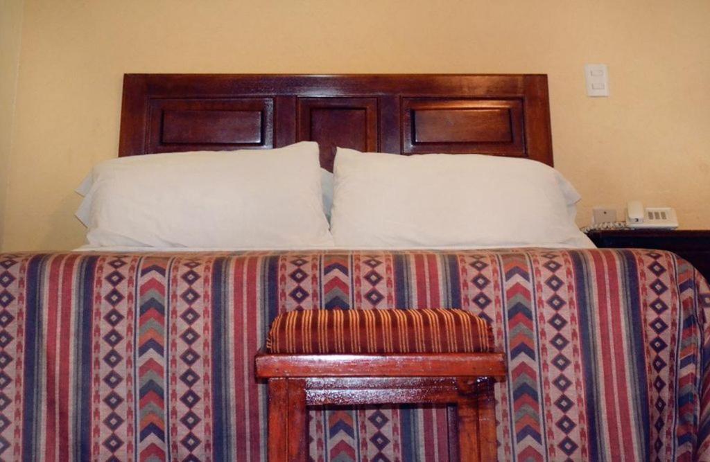 Postel nebo postele na pokoji v ubytování Posada del Marqués