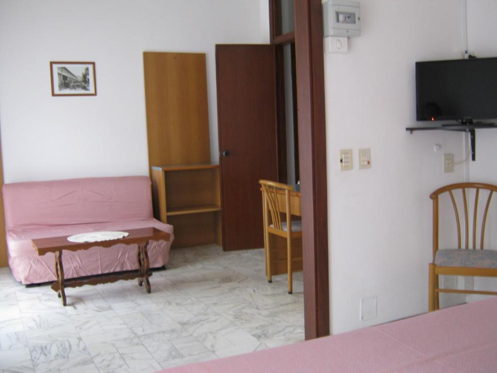 TV a/nebo společenská místnost v ubytování Hotel Valentino