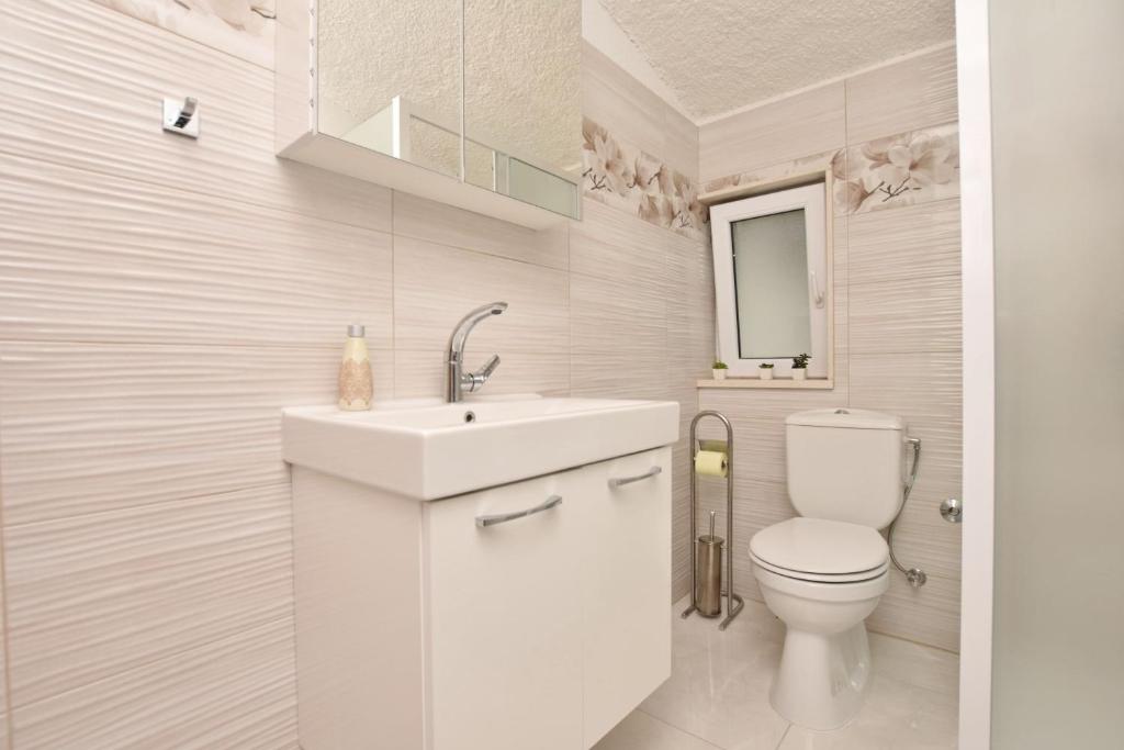 Kúpeľňa v ubytovaní Apartments Mladen