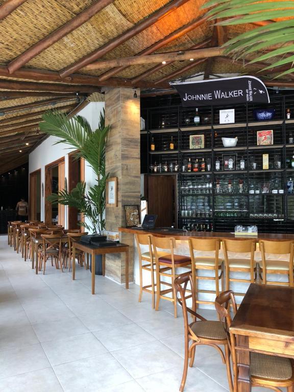  Suite 2-104 em Flat frente ao mar