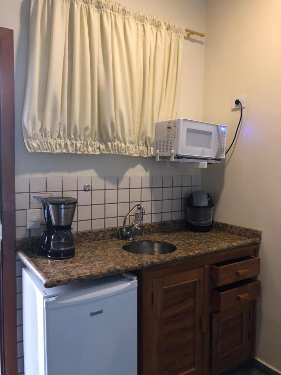  Suite 2-104 em Flat frente ao mar