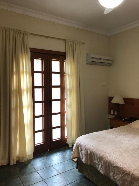  Suite 2-104 em Flat frente ao mar