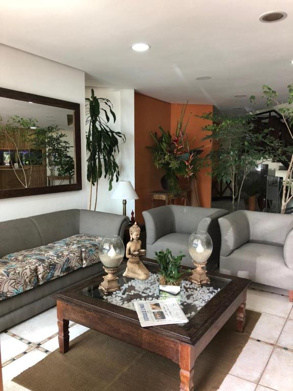  Suite 2-104 em Flat frente ao mar