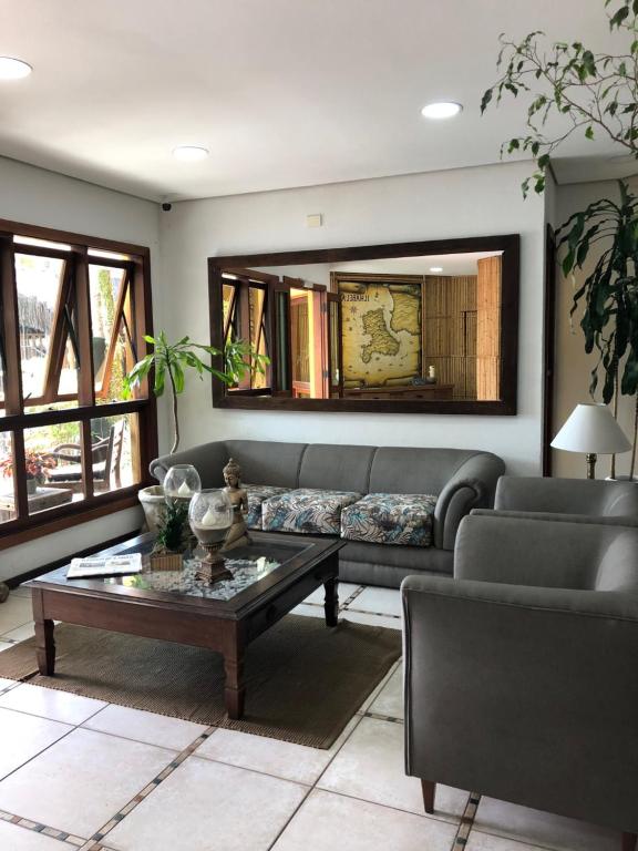  Suite 2-104 em Flat frente ao mar