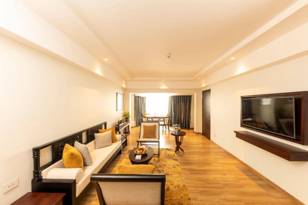 TV a/nebo společenská místnost v ubytování Taj Samudra, Colombo
