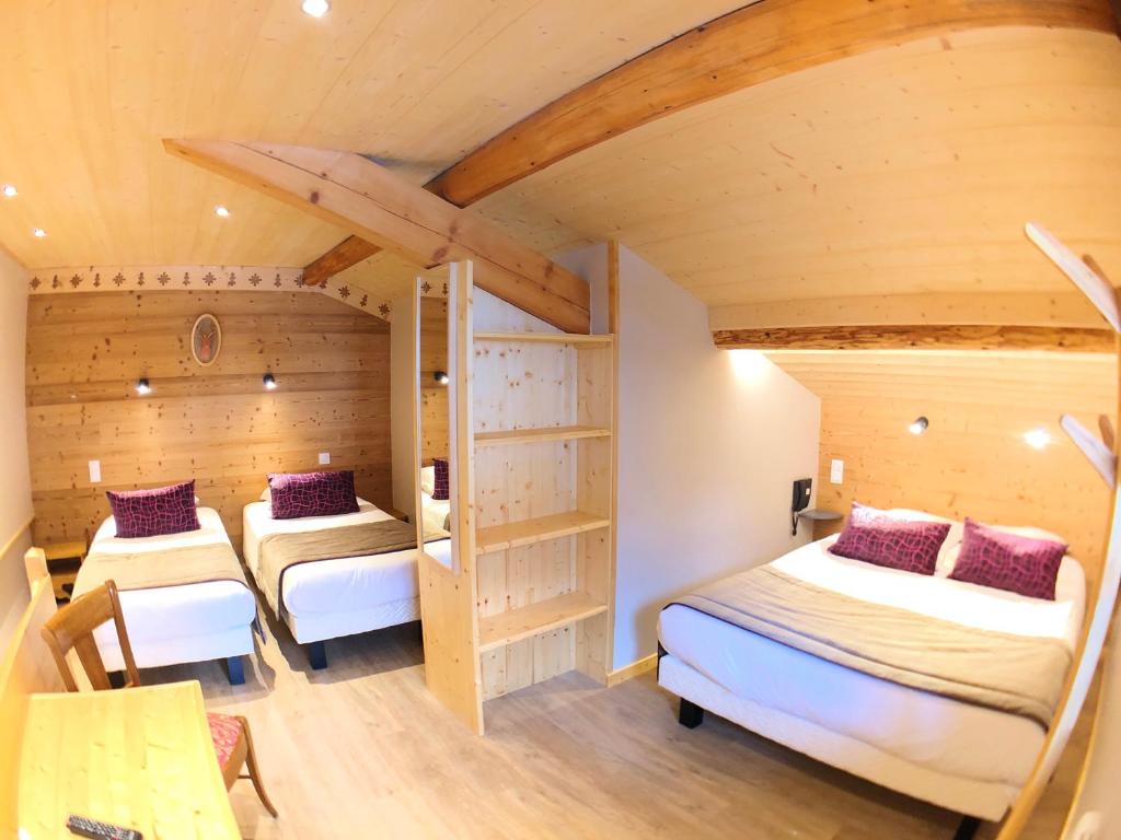 Postel nebo postele na pokoji v ubytování Hotel Le Soly